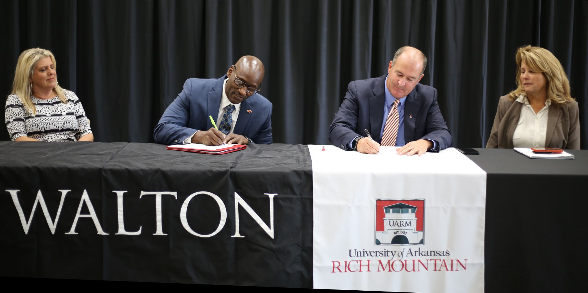 Sam M. Walton College of Business and the University of Arkansas Rich Mountain articulation signing 